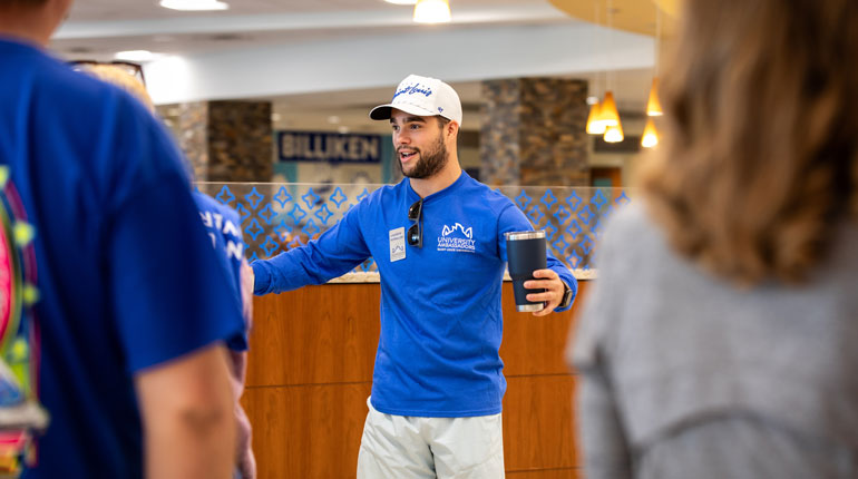 Student leader giving a tour on SLU campus