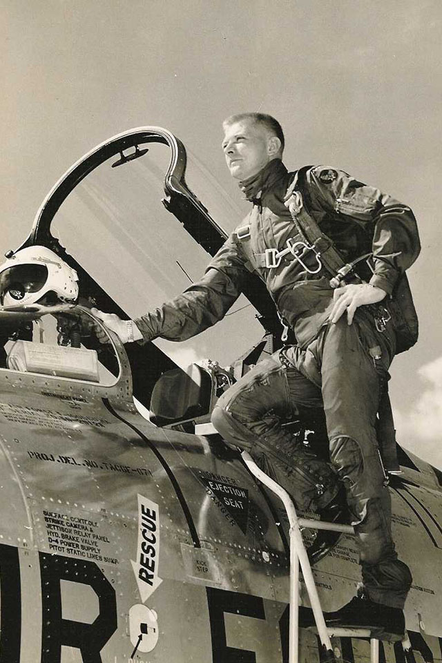 Gene Kranz Gene Kranz stands next to a plane.