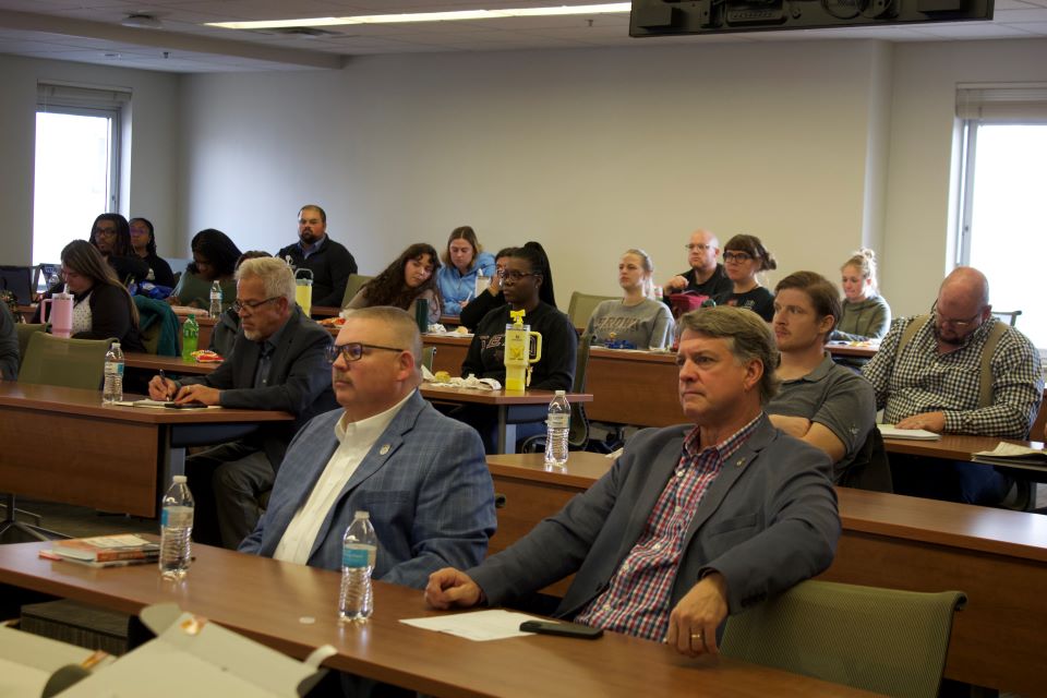 Students, reporters, and members of the public attending a Wefel Center Lecture Series. Students, reporters, and members of the public attending a Wefel Center Lecture Series.