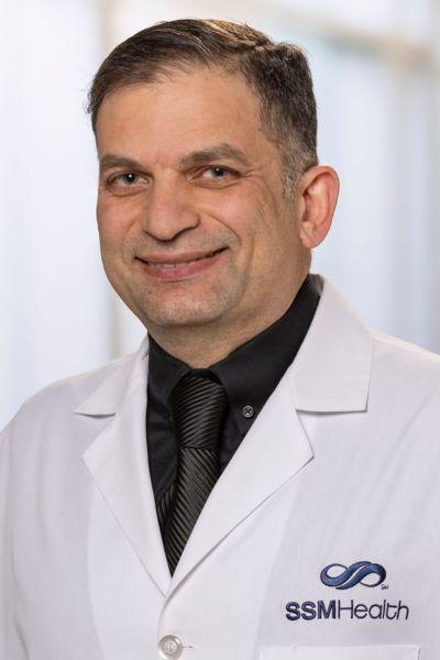 Headshot of Ayham Alkarmi
