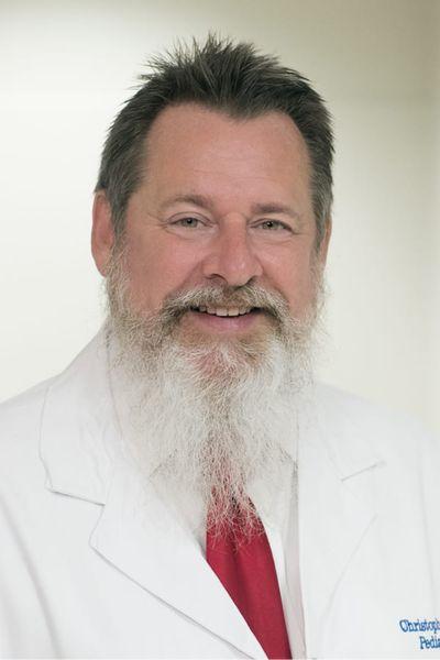 Headshot of Christopher Blewett