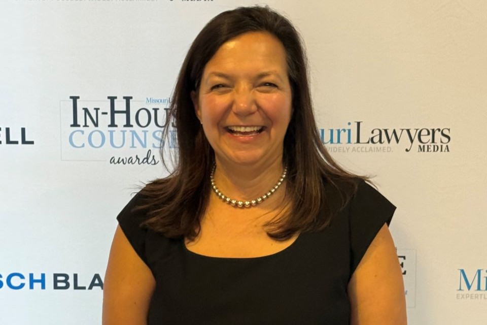 Christina Moore smiles for a photo.